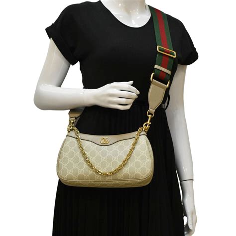 gucci 735132|Ophidia small shoulder bag in beige and ebony Supreme.